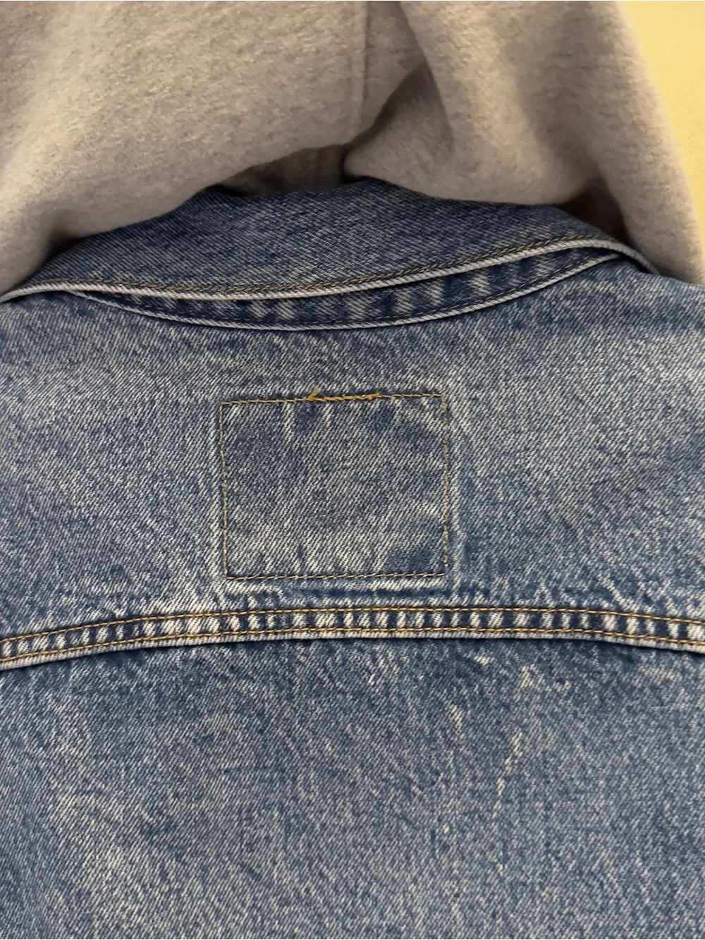 Levi's Blue Denim Jacket with Light Gray Hoodie Sleeves